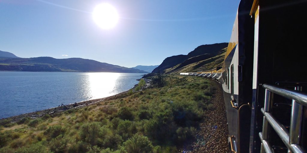 Sunset from Rocky Mountaineer Train by Lisa Niver